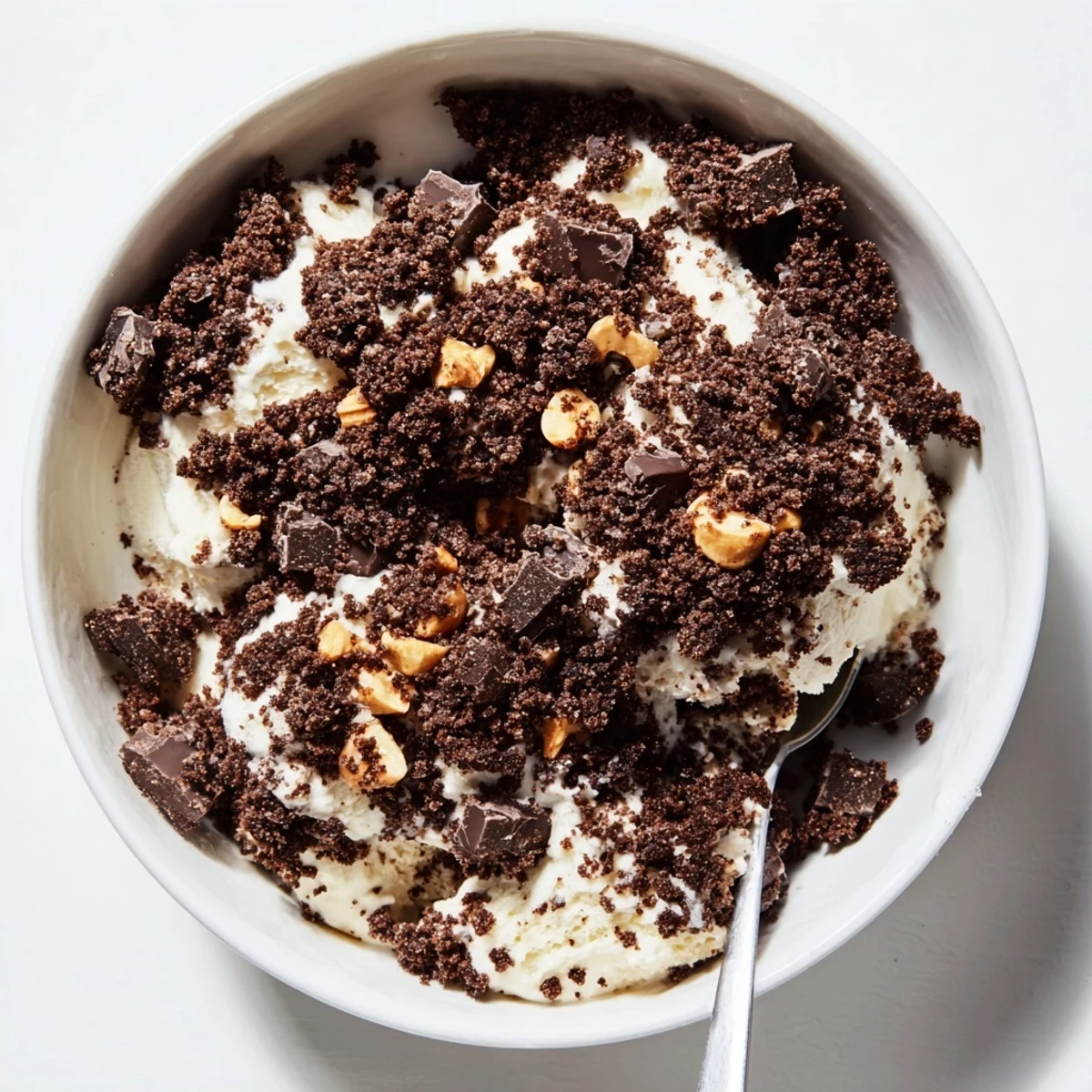 This homemade Chocolate Cookie Crumble Topping pairs perfectly with warm apple pie or rich chocolate pudding desserts.  