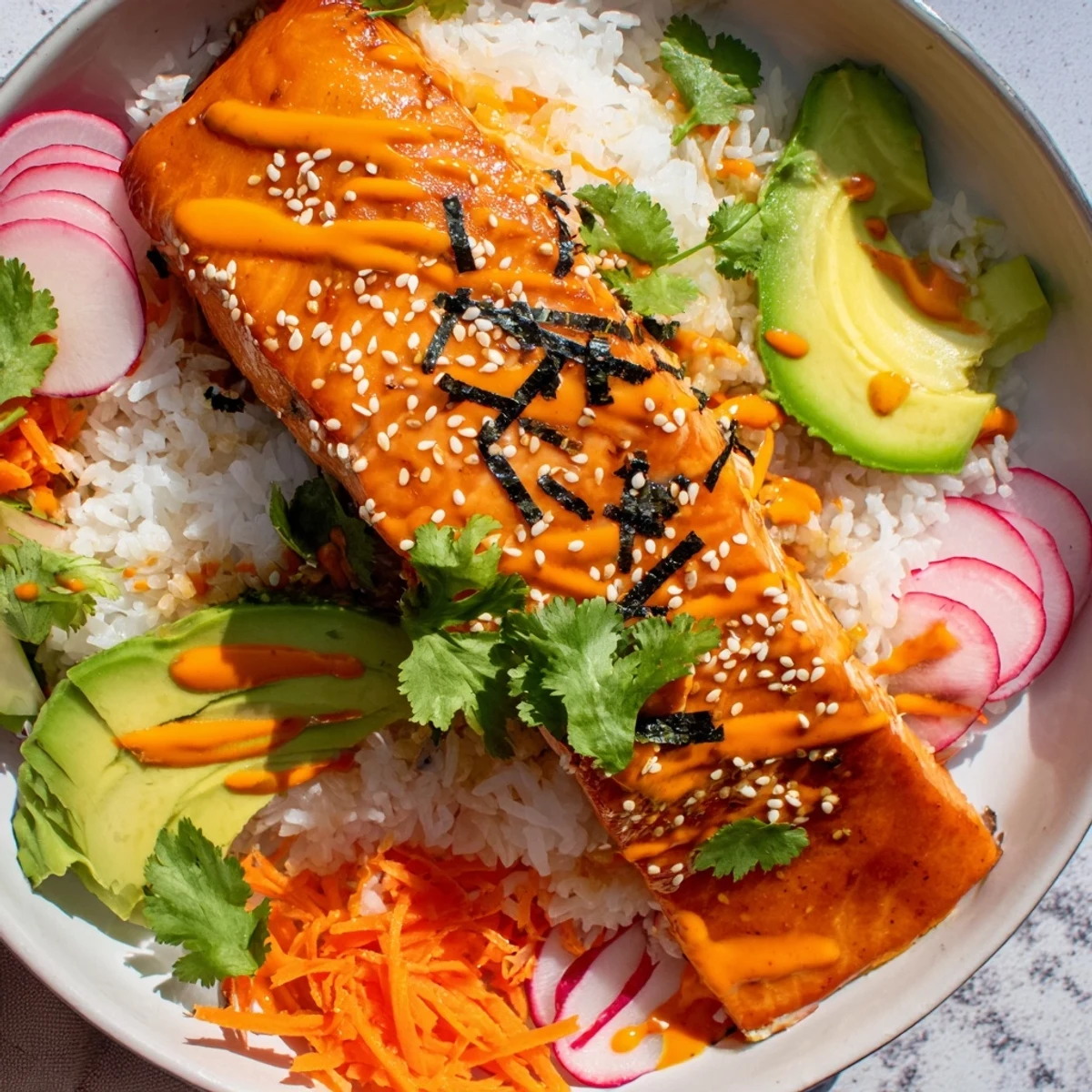 A close-up shows creamy avocado slices and crunchy pickled carrots, cucumbers, and radishes adding fresh texture.