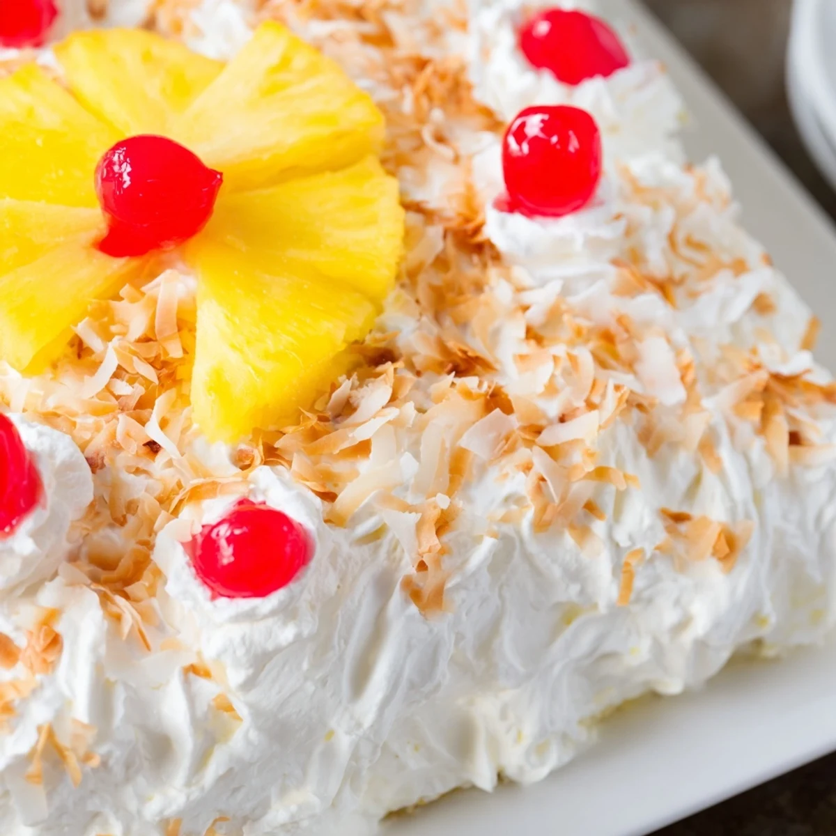 Moist tropical dessert cake drizzled with sweet condensed milk and coconut cream filling