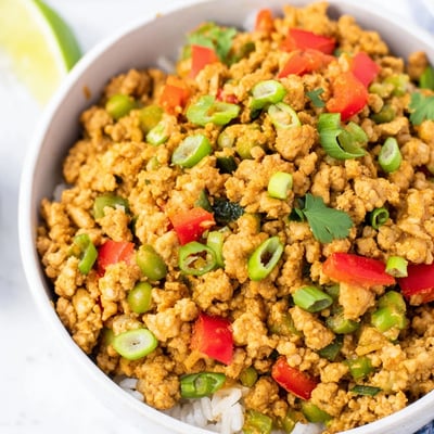 Spiced turkey rice bowls served over fluffy grains with vibrant sautéed vegetables